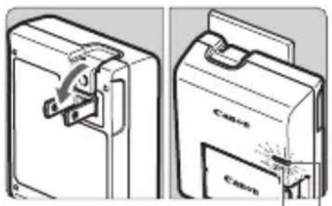 CANON EOS 1500D - Insérez la batterie. • Fixez la batterie b - 1