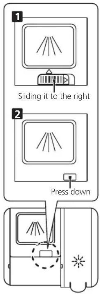 Sliding it to the right Press down