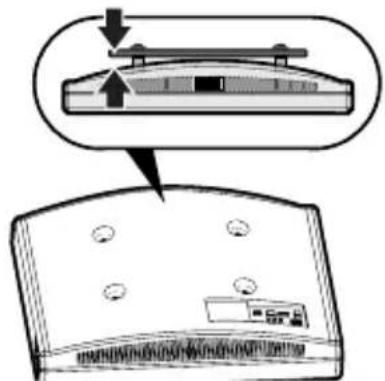 Diagram showing a device with an open lid and its internal components, with an arrow indicating the component's direction.