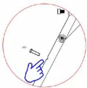 Diagram showing a hand pointing at a small object near a vertical line with a magnified inset, enclosed in a red circle.