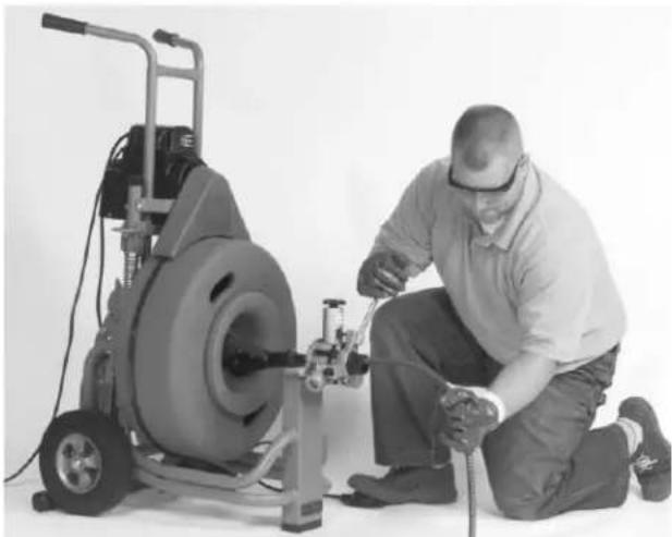 RIDGID K7500 - Be very careful when cleaning drains where cleaning compounds have been used. Avoid direct contact to the skin and especially the eyes and facial area as serious burns can result. - 1