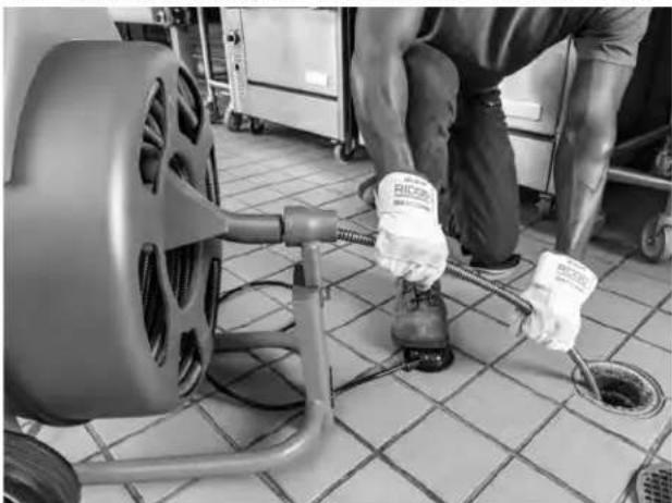 RIDGID K750R - Feeding The Cable Into The Drain - 1