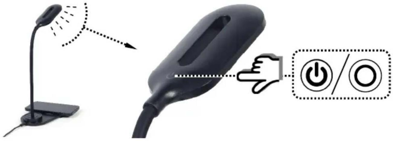 Diagram showing a desk lamp illuminating a black adjustable lamp with a hand gesture pointing to the power button icon.