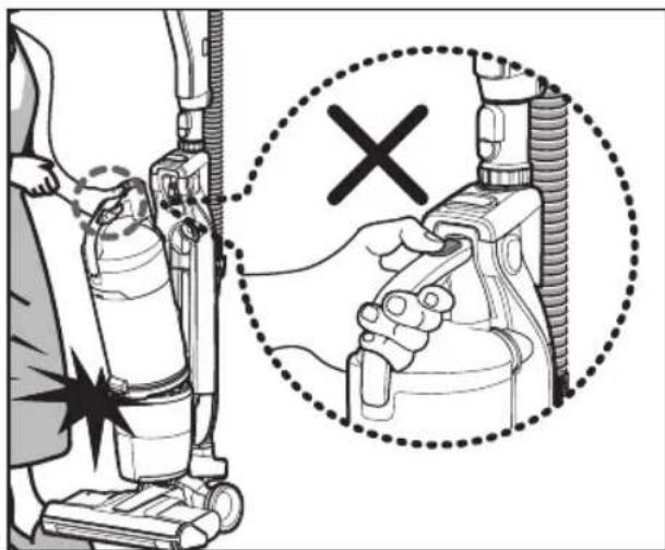 Diagram showing a person using a vacuum cleaner with a magnified view indicating the switch to a device, marked with a black X symbol.