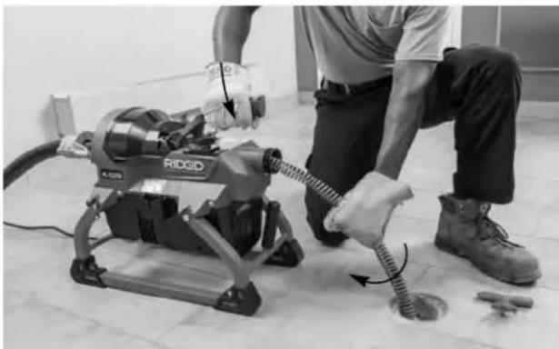 RIDGID K5208 - Feeding The Cable Into The Drain - 2