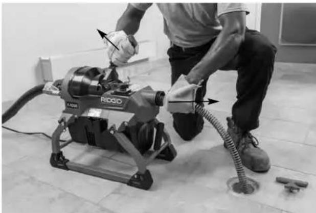 RIDGID K5208 - Feeding The Cable Into The Drain - 3