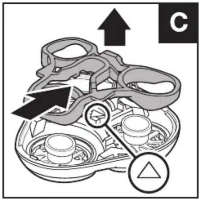 Technical diagram showing mechanical assembly with labeled components and directional arrows