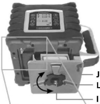 Technical diagram of a device with labeled parts (I, J, L) and internal components, showing a digital display and mechanical assembly.