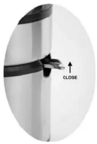 WestBend 7000CF - Juice Outlet Spout in Closed Position Juice Outlet Spout in Open Position - 1