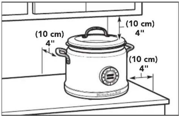 1 Insérer le récipient de cuisson dans le multicuiseur.