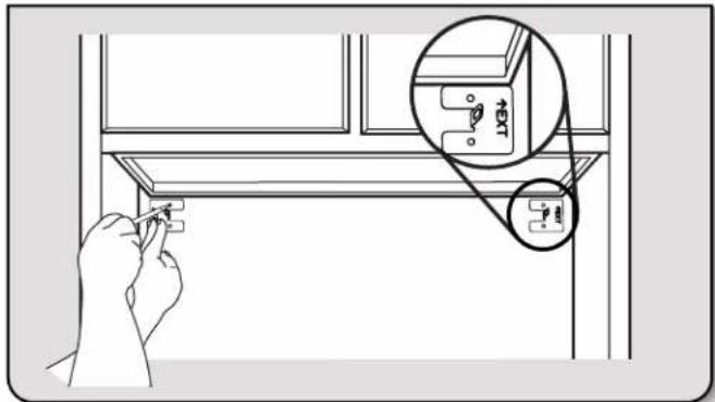 Diagram showing a hand holding a small component next to a window, with an inset magnified view highlighting a device's internal structure.