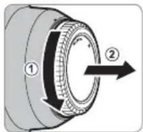 Diagram of a mechanical component with numbered parts and directional arrow indicating motion or flow