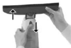 Close-up of hands holding a curved object with arrows indicating direction (no text or symbols visible)