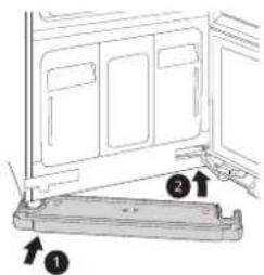 Diagram showing a door frame with labeled parts and directional arrows indicating movement or assembly.