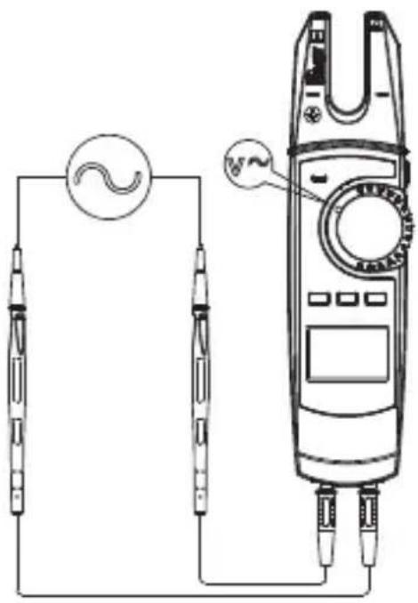 Diagram showing a multimeter connected to a circuit board with a close-up of its internal wiring and a close-up of its analog meter.
