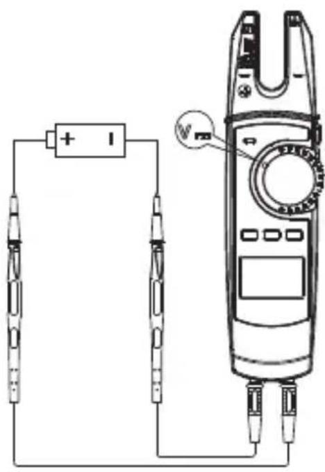 Diagram showing a multimeter connected to two probes with a battery, labeled with 'V' and polarity indicators.