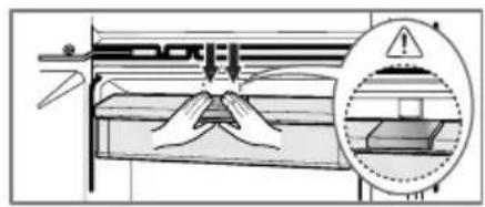Technical diagram showing a mechanical assembly with a magnified inset highlighting a warning symbol and component detail.