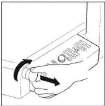 Diagram showing hand operating a device with directional arrows indicating rotation or movement