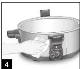 Hand cleaning a large kitchen pot with a cloth (no text or symbols visible)