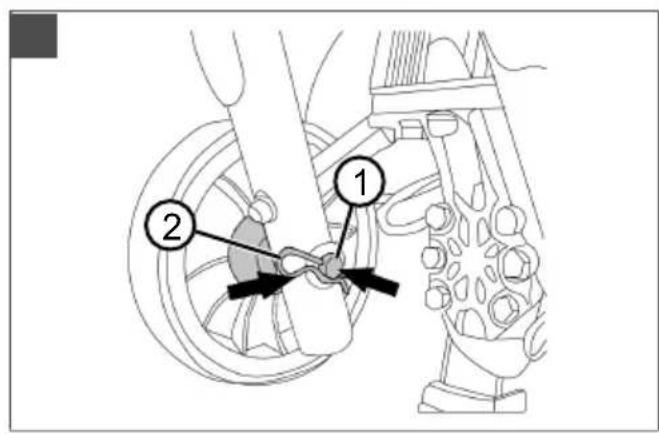 Technical diagram showing mechanical components with numbered labels 1 and 2 pointing to specific parts of a vehicle or assembly.