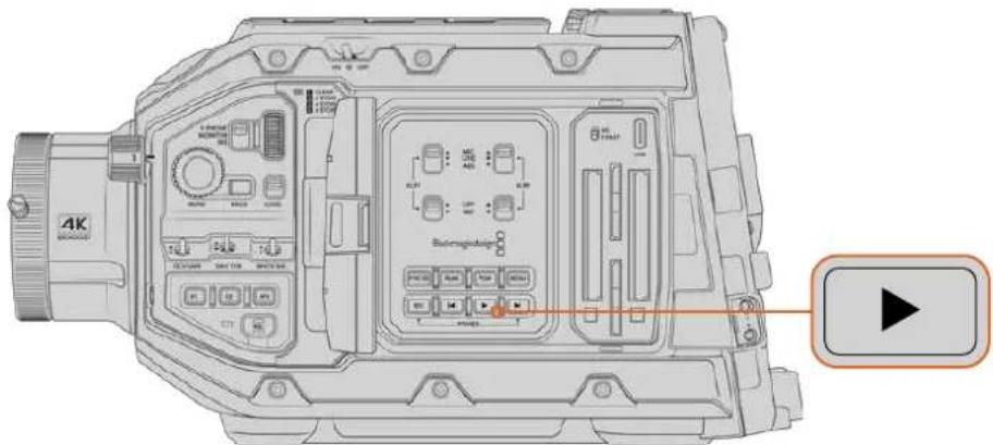 Technical diagram of a video camera module with labeled ports and control buttons, including a play button icon.
