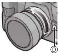 PANASONIC Lumix HF008E - Halten Sie die Objektiventriegelung gedrückt Ⓓ und drehen Sie das Objektiv so weit wie möglich in Pfeilrichtung, bis Sie es abnehmen können. - 1