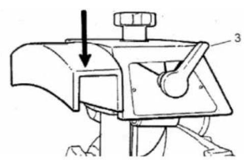 Technical diagram of a mechanical device with labeled parts and an arrow indicating direction or force