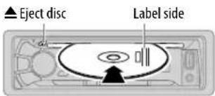 ▲ Eject disc Label side
