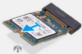 Close-up of an Intel 3.24 microprocessor with visible printed labels and a blue arrow pointing to the chip.
