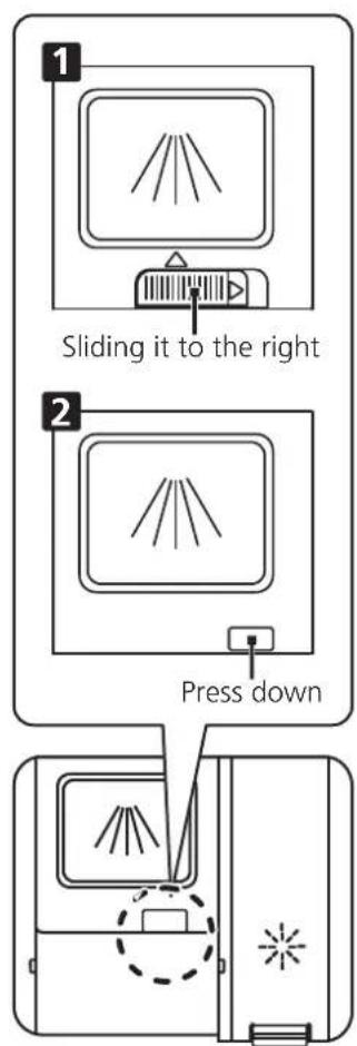 Sliding it to the right Press down