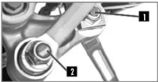 Technical diagram of a mechanical assembly with labeled parts 1 and 2