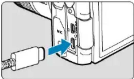 Diagram showing a device with labeled components and a blue arrow pointing to a component labeled 'MC'