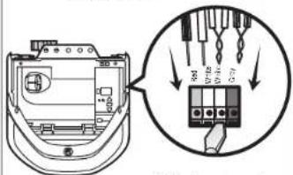 Diagram showing a device with labeled components and a magnified view of the internal component, likely illustrating a circuit or wiring setup.
