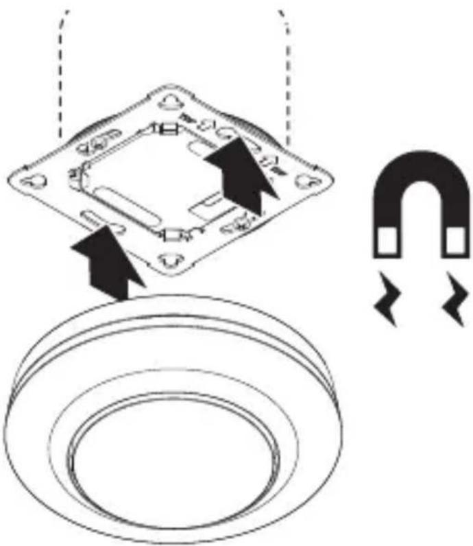 Diagram showing a mechanical component with arrows indicating direction and a U-shaped magnet symbol, likely illustrating a magnetic or electrical concept.
