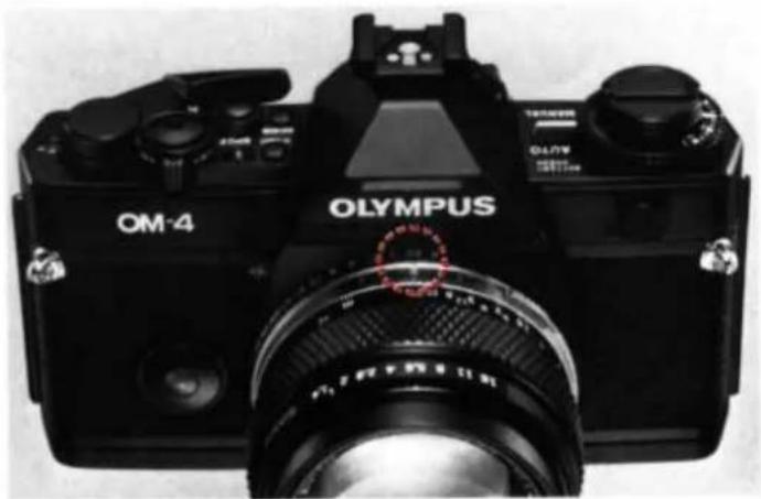 OLYMPUS OM4 - Prises de vues avec les piles epuissées Cómo disparar cuando están gastadas las pilas - 1