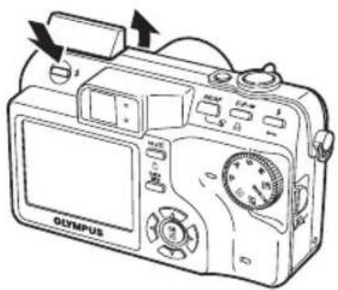 OLYMPUS Camedia C7000 Zoom - Presione el botón del flash. - 1