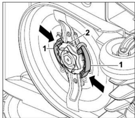 Technical diagram of a mechanical assembly with labeled parts 1 and 2, showing directional arrows indicating motion or flow.