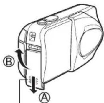 OLYMPUS X-350 - Faites glisser le couvercle du compartiment des piles vers - 1