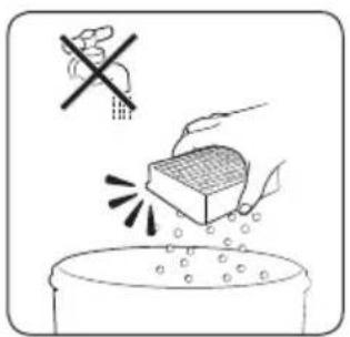Illustration showing a hand using a tool to remove debris from a container, with a crossed-out 'No' symbol above.