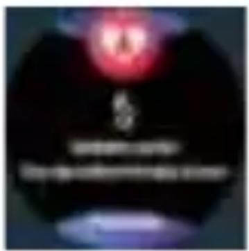 Blurred image with partial text and a red circular emblem, likely from a document or sign