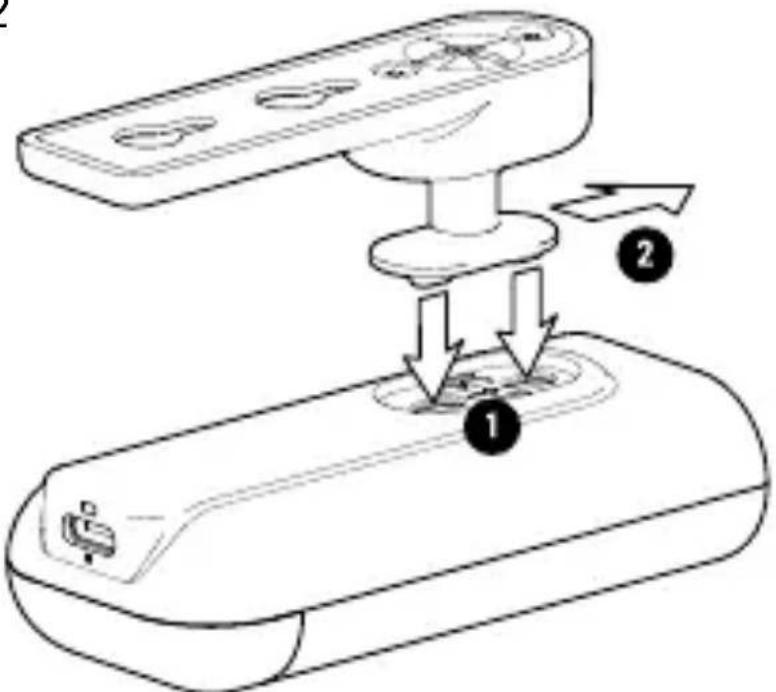 Diagram of a remote control device with labeled parts and directional arrows indicating assembly or operation.