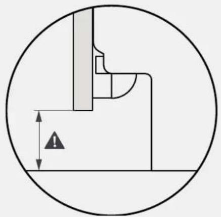 Technical diagram showing a mechanical assembly with a circular boundary and a vertical dimension line marked with an exclamation mark (no text or symbols present)