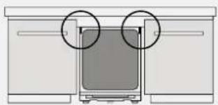 Diagram of a device with two circular annotations pointing to a screen (no text or symbols present)