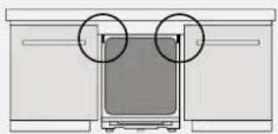 Diagram of a device with two circular annotations pointing to a central screen (no text or symbols present)