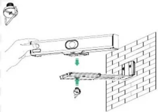 Diagram showing installation of a wall-mounted device with a hand holding a sensor and a green arrow indicating direction, alongside a close-up view of the component.