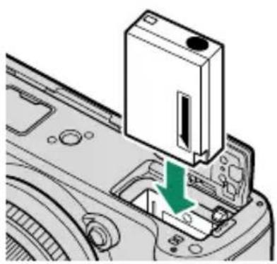 FUJI X-T3 - Insérez la batterie comme illustré. - 2
