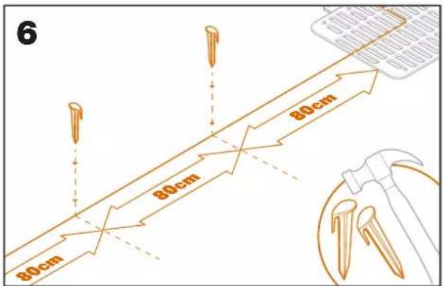 WORX Landroid S300 WR130E - Fixez le fil au sol à l'aide des chevilles - 1