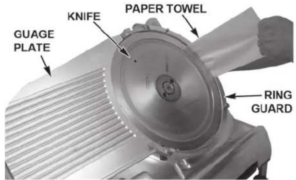 Hobart HS8 - ⚠ WARNING The slicer knife is very sharp. Exercise extreme caution when working near the knife. - 1