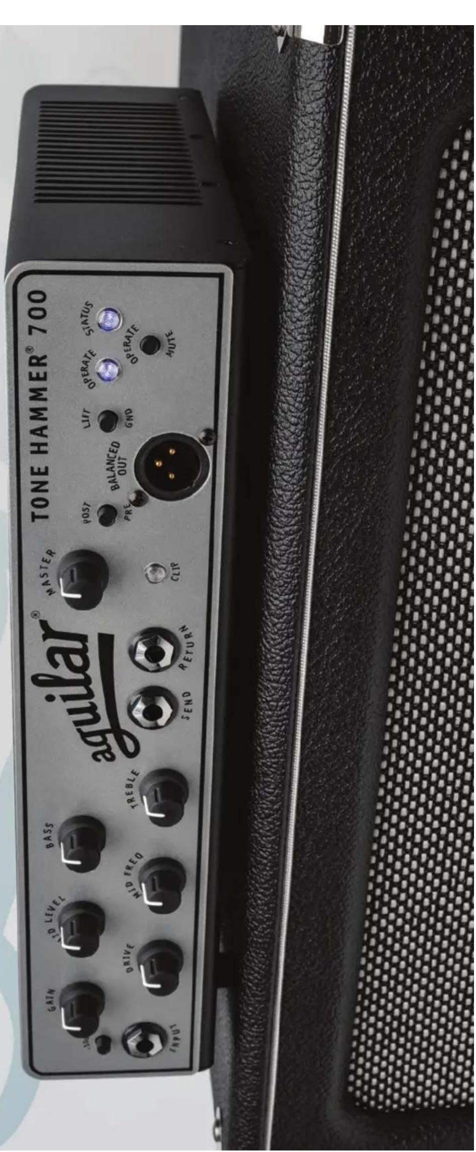 TONE HAMMER® 700 aguilar® GAIN LID LEVEL BASS -10A DRIVE MID FREQ TREBLE SEND RETURN MASTER POST PRE BALANCED OUT LIFT GND OPERATE STATUS OPERAPE MUTE