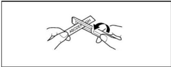 BROTHER P-Touch PT-2420PC - Removing the label backing - 1